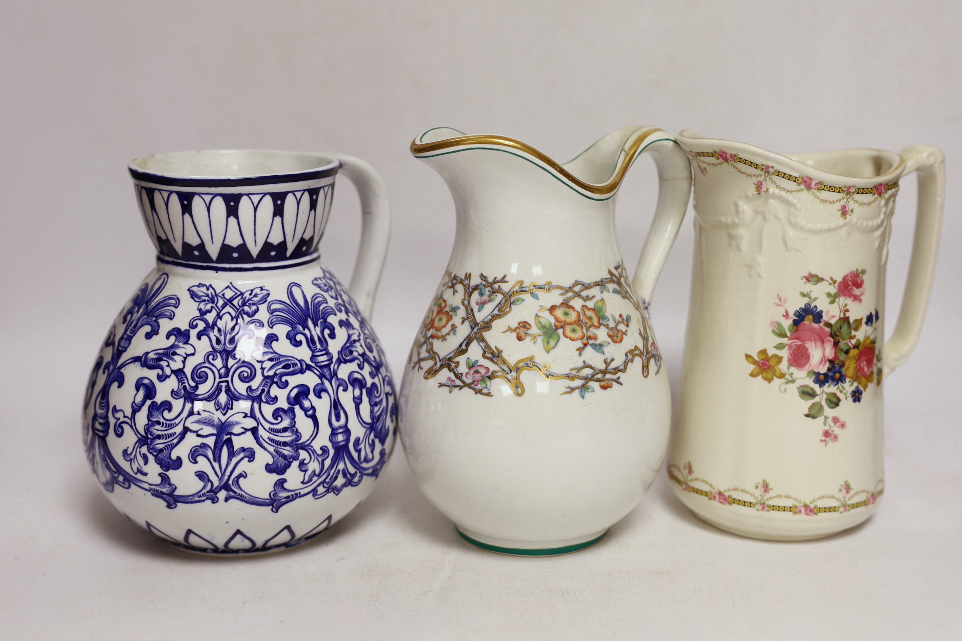 Seven late 19th century and early 20th century jugs, tallest 19cm